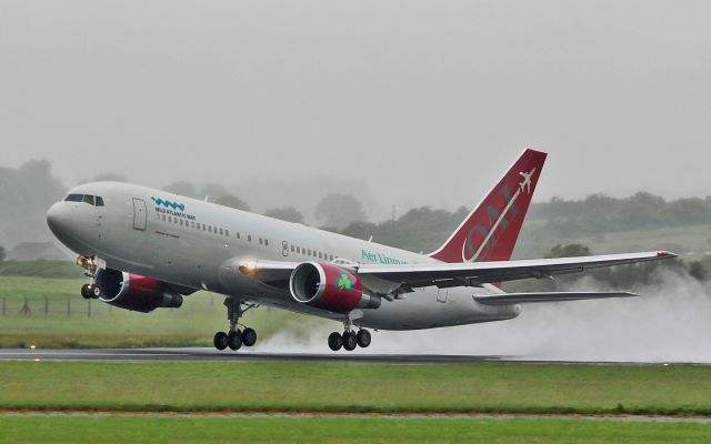 BOEING 767-200 (N225AX) - aer lingus b767-2 n225ax dep shannon for boston in bad weather 17/6/15.