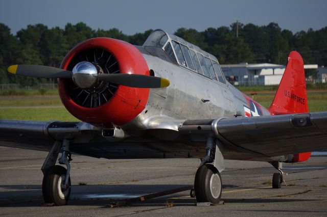 North American T-6 Texan — - Another of Chris Rounds T-6 in morning sun at Douglas.