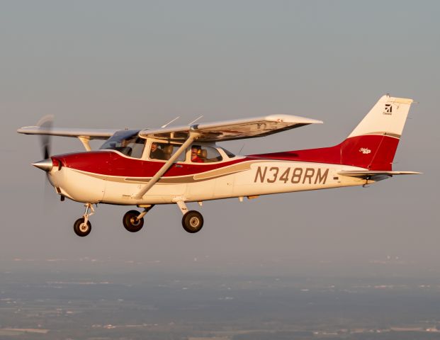 Cessna Skyhawk (N348RM) - My friends Jake and Erik flying in N348RM while Jurian and myself fly in formation after departure from Richmond, Indiana.