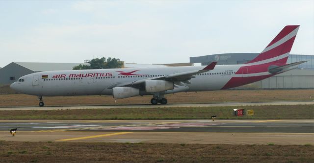 Airbus A330-300 (3B-NBD) - Seen landing RWY13 