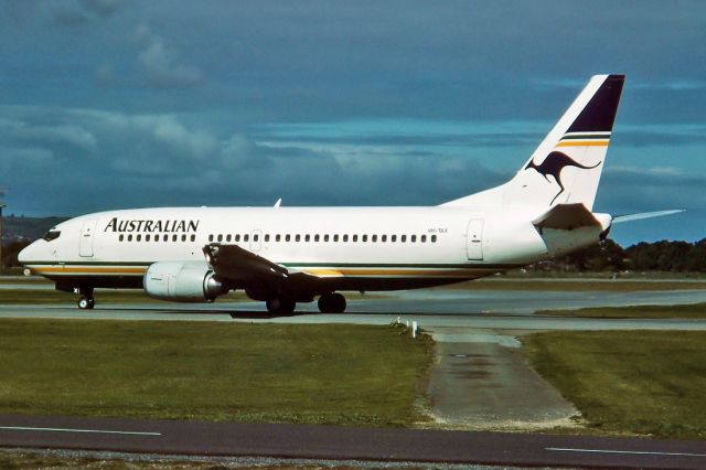 Piper Cherokee (VH-TAX) - AUSTRALIAN AIRLINES - BOEING 737-376 - REG : VH-TAX (CN 23489/1356) - WEST BEACH ADELAIDE SA. AUSTRALIA - YPAD (31/8/1991) SCANNED FROM A 35MM SLIDE AT 6400 DPI