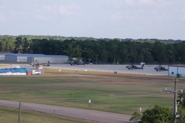 — — - AH-64Ds parked at Lone Star.