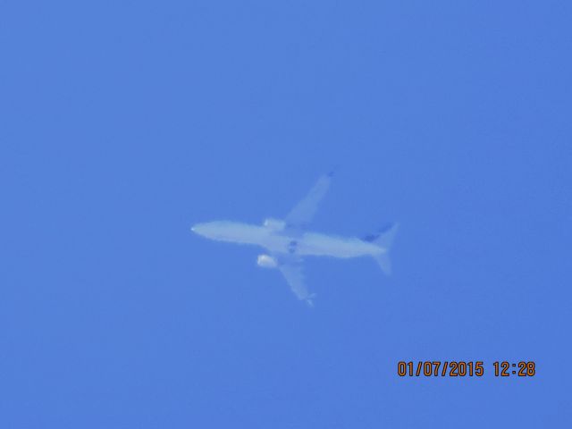 Boeing 737-800 (C-FWJS) - WestJet airlines flight 2310 from YYC to CUN over Southeastern Kansas at 35,000 feet.