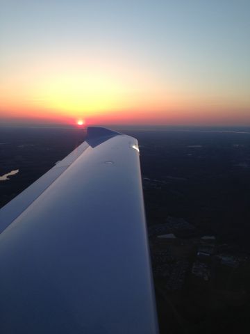 Diamond Star (N129DK) - Flying back home watching the sun drop