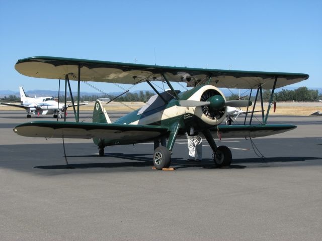 — — - Green Stearman from my hometown of Upland at KRDD.