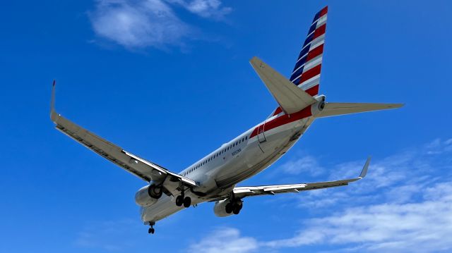 Boeing 737-800 (N892NN) - N892NN, an AAL Boeing 737-823, over the numbers @ TNCM. 3/21/22. 