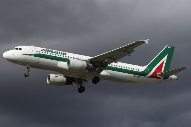 — — - Alitalia A320-200 approaching runway 027L at LHR.