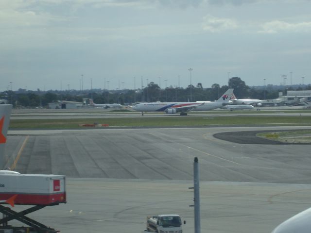 Airbus A330-300 (9M-MTK) - MH#125 ARRIVING ON RWY 21
