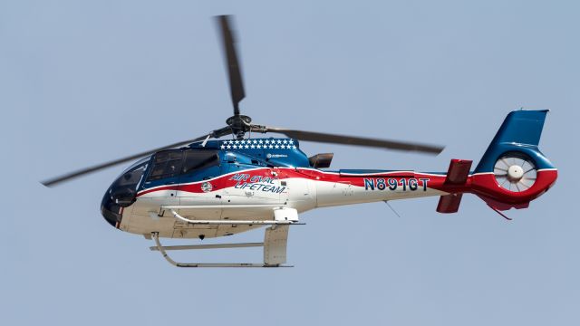 Eurocopter EC-130 (N891GT) - An EC30 Medical Helicopter from Air Evac LifeTeam passes over, as it starts it's pass down down town La Porte, Indiana for the fly over, for the 4th of July Parade 7/4/22 
