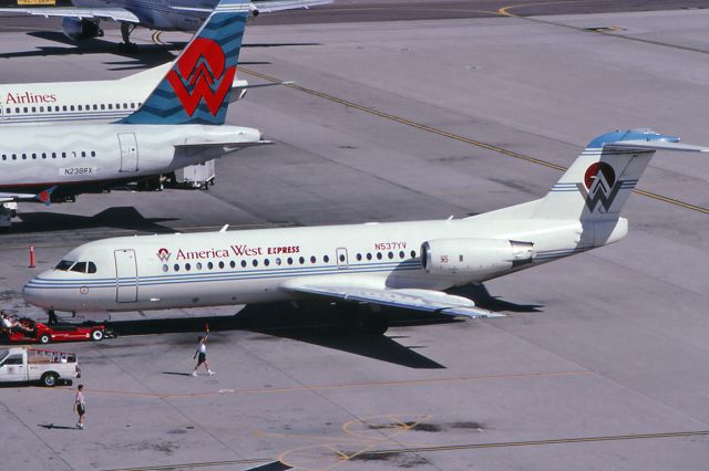 Fokker 70 (N537YV) - March 1997 - one of two Fokker 70s operated by America West Express. Photo taken from top of Terminal 4 parking garage.