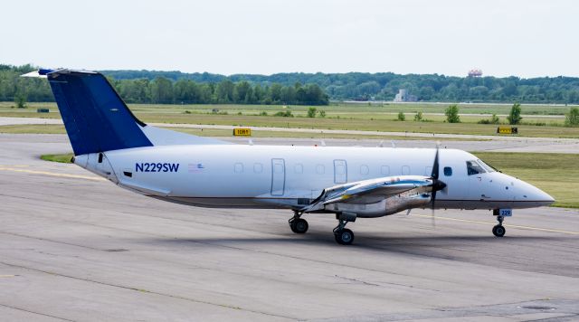 Embraer EMB-120 Brasilia (N229SW) - Airline: Berry Aviationbr /Aircraft: Embraer EMB-120FCbr /Registration: N229SWbr /Age of Airframe: 23.8 Years Oldbr /Delivered: November 11th, 1995 to SkyWest Airlinesbr /Photo Location: Niagara Falls International Airport (KIAG)br /Photo Date: July 26th, 2018