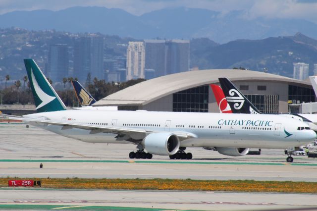 BOEING 777-300ER (B-KQO) - TAXING TO 25R