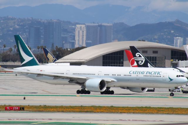 BOEING 777-300ER (B-KQO) - TAXING TO 25R