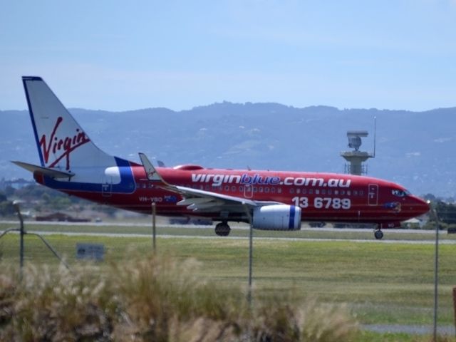 Boeing 737-700 (VH-VBO) - On taxi-way, heading for take off on runway 05.