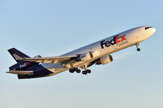 Boeing MD-11 (N597FE) - 12-12-21 23-L. Golden Hour departure just prior to sunset.