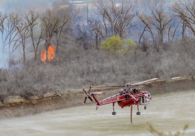 N718HT — - Drafting from the Colorado River during wildfire operations. 2009