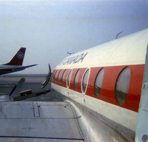 VICKERS Viscount (C-FTHL) - This is Air Canada Viscount CF-THL at Ottawa and Montreal in late summer of 1973. Photographs by Alfred Holden. Viscount service was winding down, at the time. As a teenager I somehow rounded up the fare to fly Ottawa-Montreal (Viscount) and Montreal-Burlington Vt. (Allegheny BAC-1-11) a couple of times, to visit family. All the pictures appear to be from the same trip - the aircraft, the tail, the view from my seat, the interior with flight attendant, luggage being unloaded in Montreal, plus my window seat (and a big window it was). As you can see, by this time these had four abreast seating and felt very roomy to fly in, a full-sized cabin carrying only about 40 people. Taken with my Kodak Instamatic, so not so sharp, but perhaps a nice set for folks to look at -- a Vickers Viscount near the end of its front-line service. These had been a real workhorse for Air Canada.