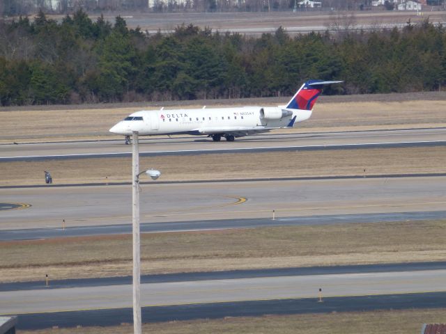 Canadair Regional Jet CRJ-200 (N835AY) - @IAD Daily Parking Garage #2 5th floor