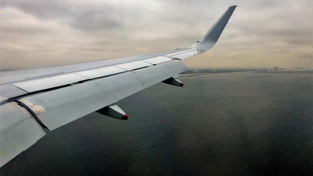 Airbus A320neo (G-TTNH) - Short final for 22L.  From seat 21F.