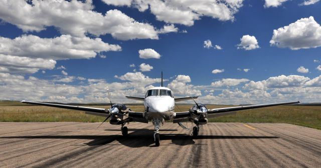 Beechcraft King Air 90 — - On the ramp at Silver West Airport.  Westcliffe, Colorado.