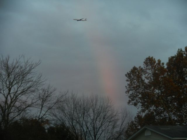 BOEING 777-300ER (F-GSQF) - A Air France Boeing 777-300ER Approaches Dulles Int Airport Flying Right By A Rainbow! A Very Great Occasion!