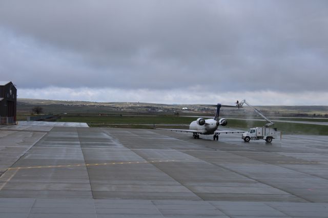 Canadair Regional Jet CRJ-700 (N156GJ) - From the observation deck at KCPR deicing