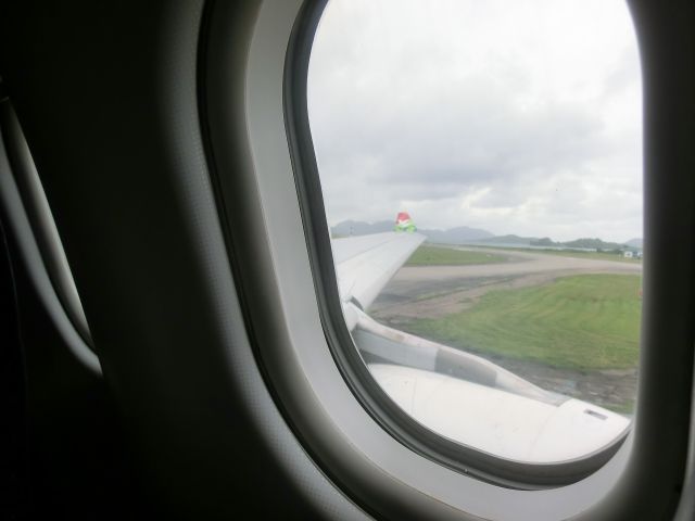 Airbus A330-300 — - Making her way in and spotted from the window, islands in the background under low lying clouds.  The winglet is visible with the distinctive Air Seychelles colors.  This A330 is quite comfortable and replaced a Boeing 767 that was in their fleet before.