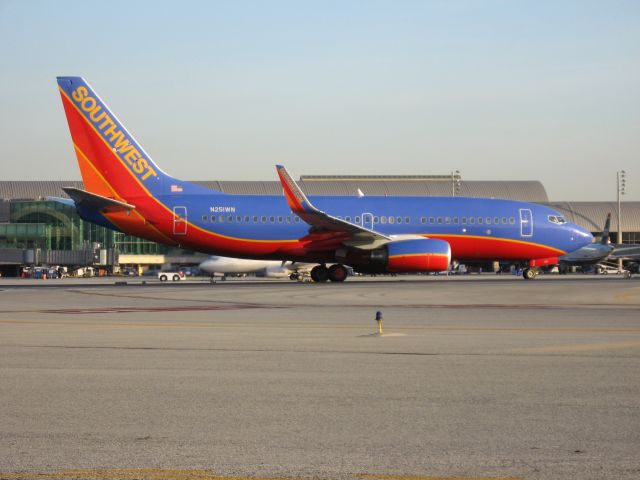 Boeing 737-700 (N251WN) - Holding on RWY 19R