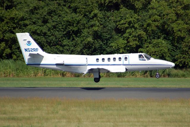 Cessna Citation II (NOAA52) - The Cessna Citation (CE-550) is a versatile twin-engine jet aircraft modified for acquiring remote sensing imagery. The aircraft is equipped with two equal sized camera ports which can support a wide variety of remote sensing configurations including large format aerial photography as well as data collection for digital cameras, hyperspectral, multispectral, and LIDAR systems.     Standard configuration includes space for two pilots, two equipment operators, and a scientific equipment rack. The aircraft can accommodate additional passengers depending on the amount of scientific equipment. The aircrafts unique side-by-side sensor port modification allows two different sensors to collect data simultaneously. The sensor ports have glass optical flats that allow the cabin to remain pressurized. Additionally, two high-precision GPS antennas provide signals to user receivers.     The Citation primarily supports the Remote Sensing Division of the National Geodetic Survey, collecting remote sensing data in support of coastal mapping and remote sensing research. Imagery acquired onboard the Citation is used for updating the shoreline and shore features on NOAAs nautical charts. The Citation also serves as an emergency responder during hurricane season by collecting digital photography of damaged areas caused by hurricane landfall.