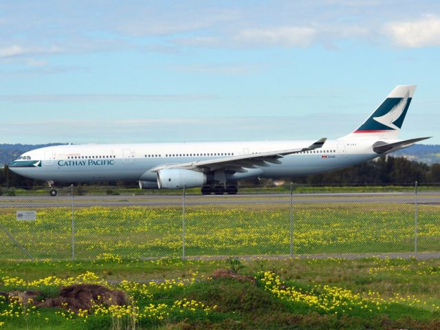 Airbus A330-300 (B-LAJ) - Rolling for take off on runway 05, for flight home to Hong Kong via Melbourne. Thursday 12th July 2012.