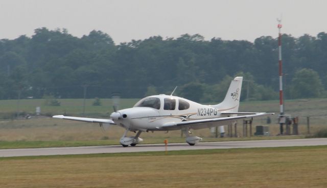 Cirrus SR-22 (N234PG) - Landing rwy 27; summer of 2012...