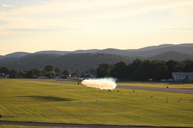 Piper L-21 Super Cub — - A Piper PA-18 with smoke after a low pass over runway 27L at William T. Piper Memorial Airport in Lock Haven, Pennsylvania. Sentimental Journey 6/20/17br /br /Canon T5