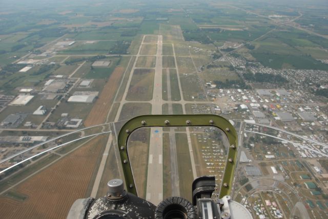 Boeing B-17 Flying Fortress (N5017N) - Taken from the front bomb aiming turret, flying south over Oshkosh in 2007