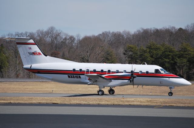 Embraer EMB-120 Brasilia (N331CR) - RCR AIR LLC (Richard Childress Racing)making a stop at JQF before continuing on to Daytona. - 2/15/11