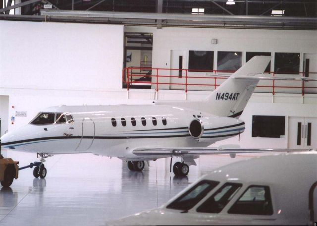 North American TB-25 Mitchell (N494AT) - KAISERAIR HAWKER IN HANGER # 2 @ FARNBOROUGH AIRPORT BEING TOWED FOR A FLIGHT