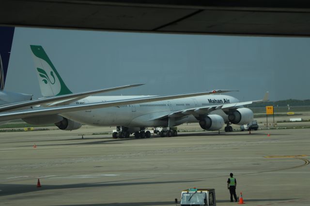 Airbus A340-600 (EP-MMO) - 6/25/18 Mahan Air parked on Apron 8, hardstand 810 east of Terminal 2, Pudong. 