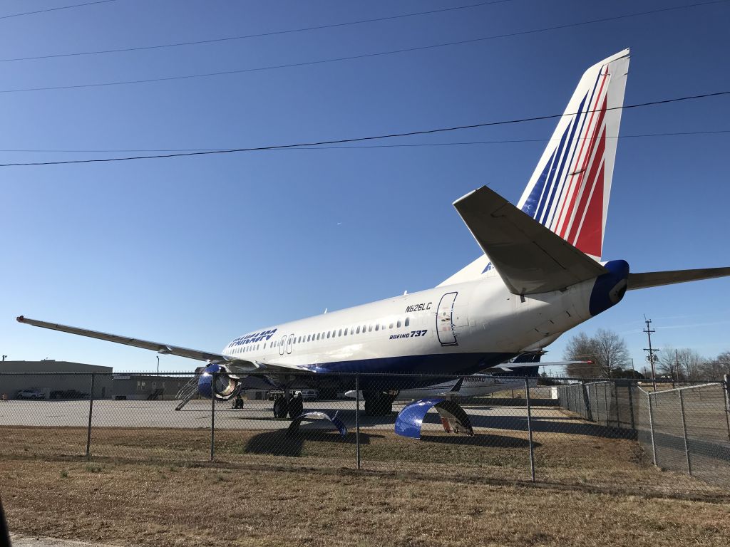 BOEING 737-400 (N826LC) - You never know what you may find at GYH. Former Transaero 737 being parted out.