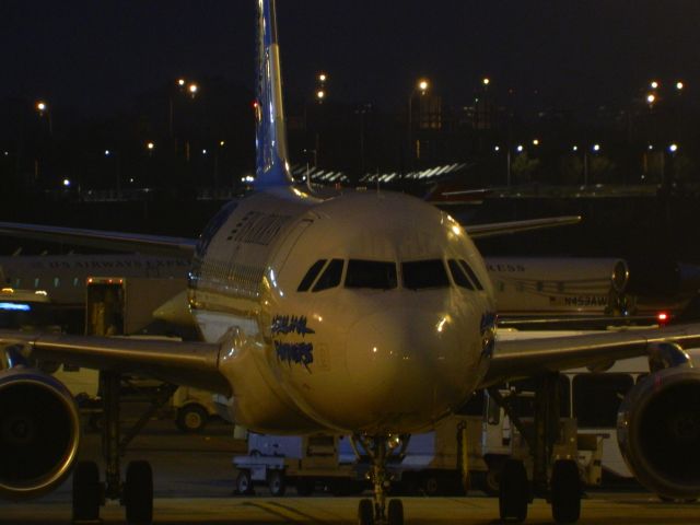 Airbus A319 (N717UW) - A US Airways A319 is parked for the night at Reagan National after arriving from Charlotte.