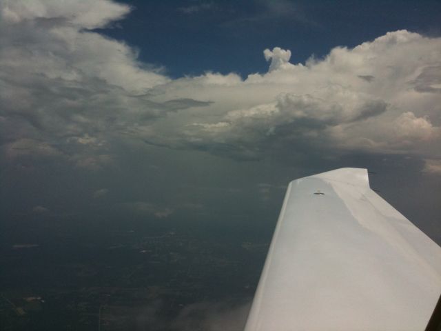 Diamond Star (N867DS) - In-route clouds over Southern Alabama / South GA line.