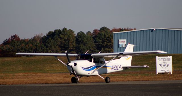 Cessna Skyhawk (N169LP) - Taxiing to parking is this 1999 Cessna Skyhawk 172S in the Autumn of 2020.