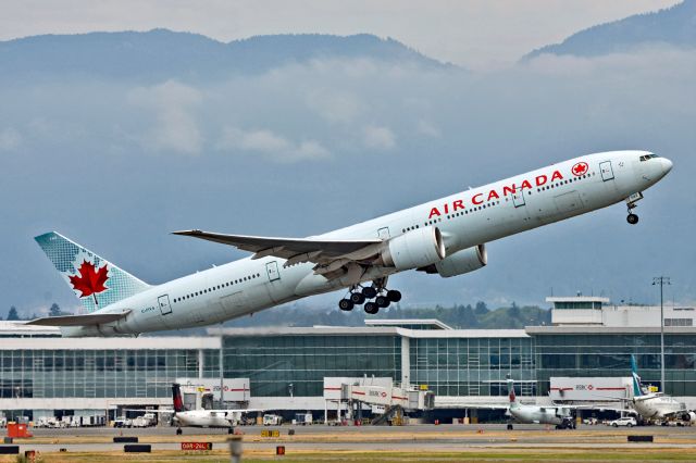 BOEING 777-300 (C-FIVS) - An empty preighter taking off