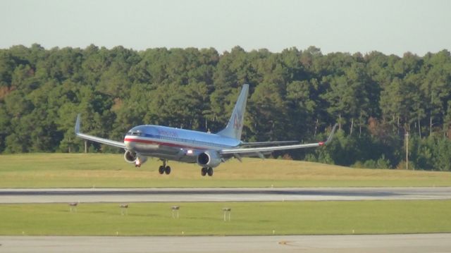 Boeing 737-800 (N880AN) - American 1832 arriving from Miami at 5:23 P.M. on runway 23R.