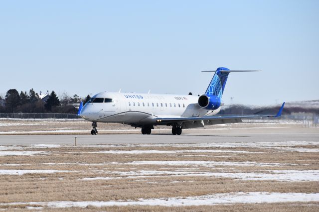 Canadair Regional Jet CRJ-200 (N221PS) - United Express, operated by SkyWest Airlines, first landing at Mason City Municipal Airport March 1, 2021.  