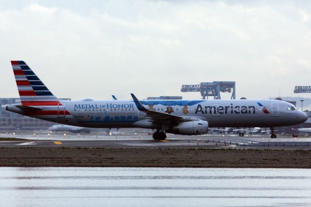 Airbus A321 (N167AN) - American A321 in special 'Flagship Valor' livery arriving to a rainy Logan Airport on 10/17/22. God Bless our Veterans!