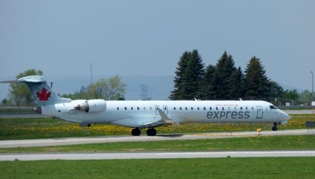 Canadair Regional Jet CRJ-900 (C-GJAZ) - Shown here taxiing is a Air Canada Canadair Regional Jet CRJ-900 in the Spring of 2017.