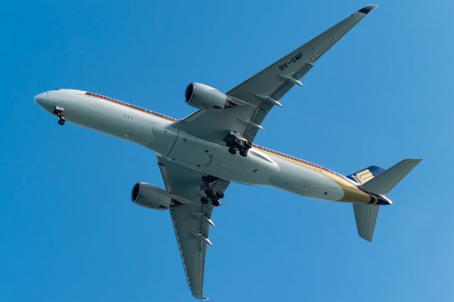 Airbus A350-900 (9V-SMF) - Singapore A350 overhead with no cloud in site after coming in with a ominous background. Yet it seems it escaped the clouds here