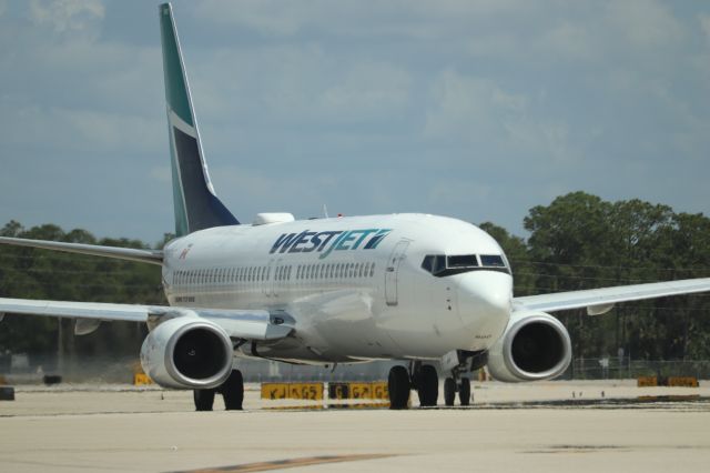 Boeing 737-800 (C-GWWJ) - WestJet Flight 1185 (C-GWWJ) taxis at Southwest Florida International Airport prior to fight to Toronto Pearson International Airport