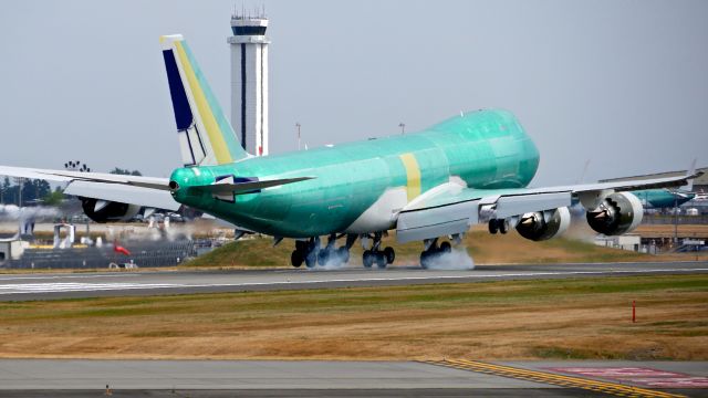 BOEING 747-8 (N861GT) - BOE702 touches down on Rwy 16R to conclude a B1 flight on 8.19.22. (B747-8F / ln 1572 / cn 67148).