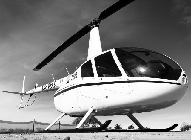 Robinson R-66 (XA-AHX) - Waiting in the middle of the dessert.