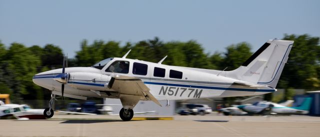 Beechcraft Baron (58) (N5177M) - On flightline